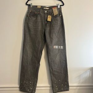 Levi's Women's Straight Leg Jeans in Washed Gray with Paint Splatter